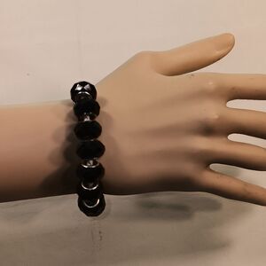 woman black bracelet